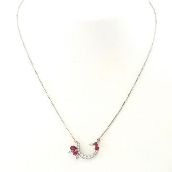 Necklace 18K white gold with faceted rubies and diamonds.