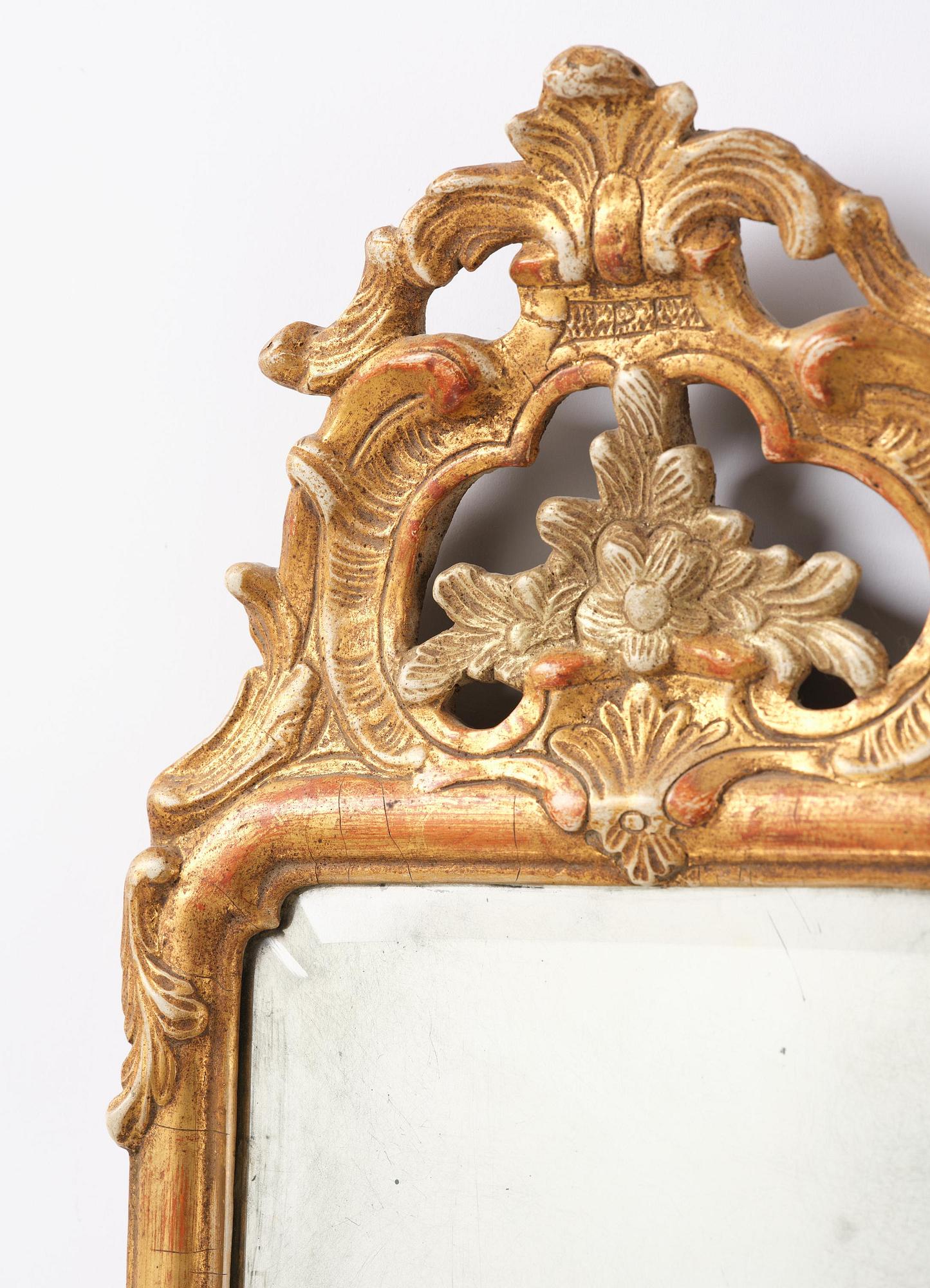 A pair of giltwood one-branch girandole mirrors by JP Larsson.