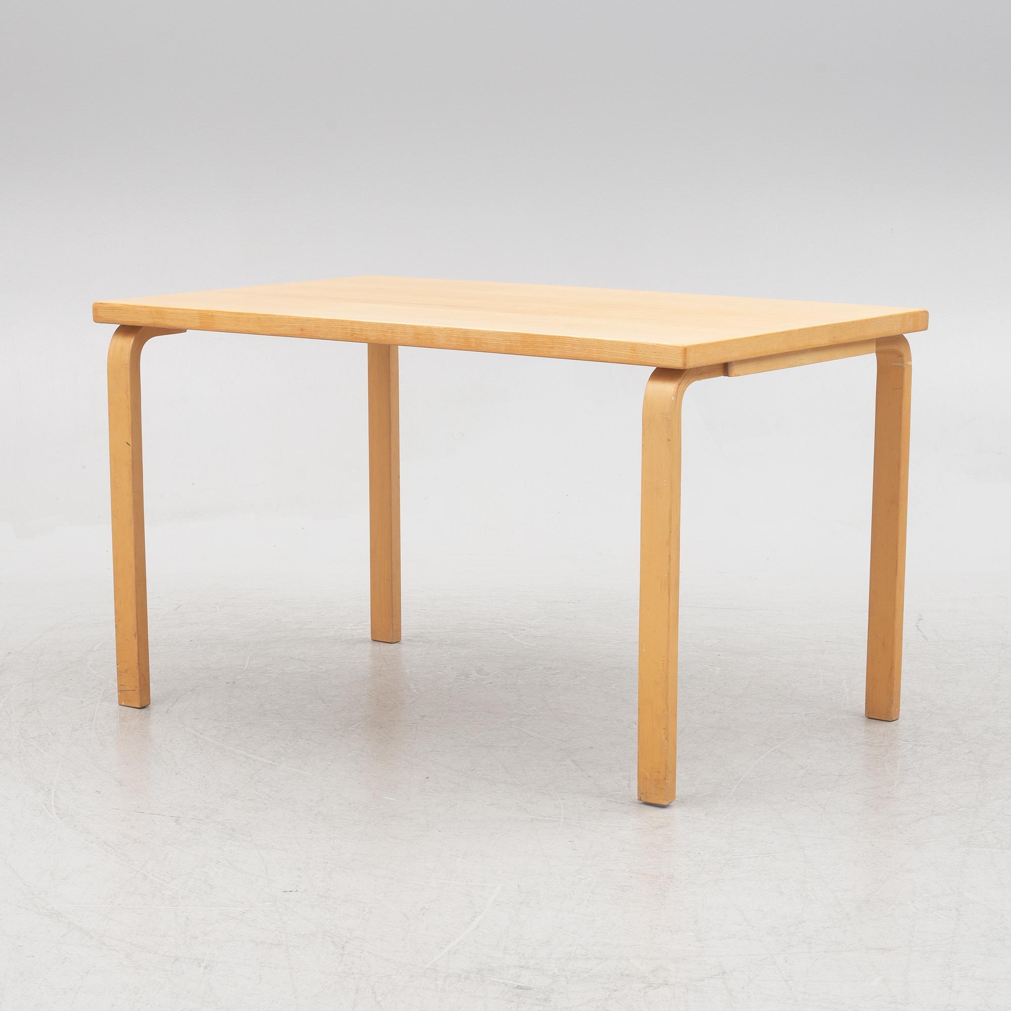 Alvar Aalto, a model 81B birch dining table, Artek, Finland.
