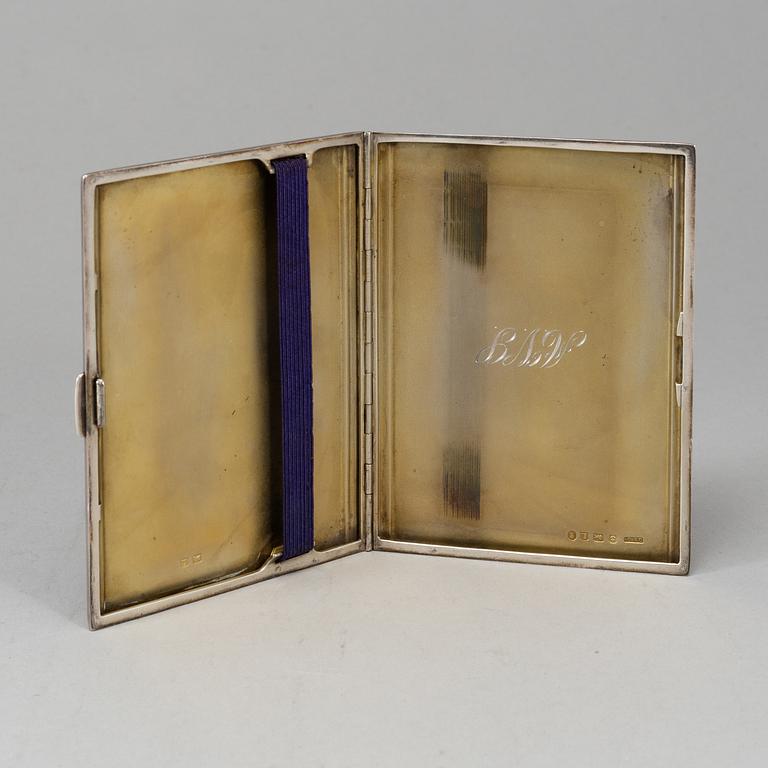 A sterling silver cigarette-case, made in 1935 by Dingley (or Davies) Brothers, Birmingham, England.