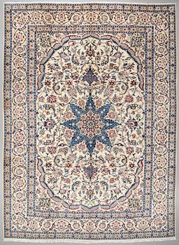 A Nain rug, part silk, 397 x 289 cm.