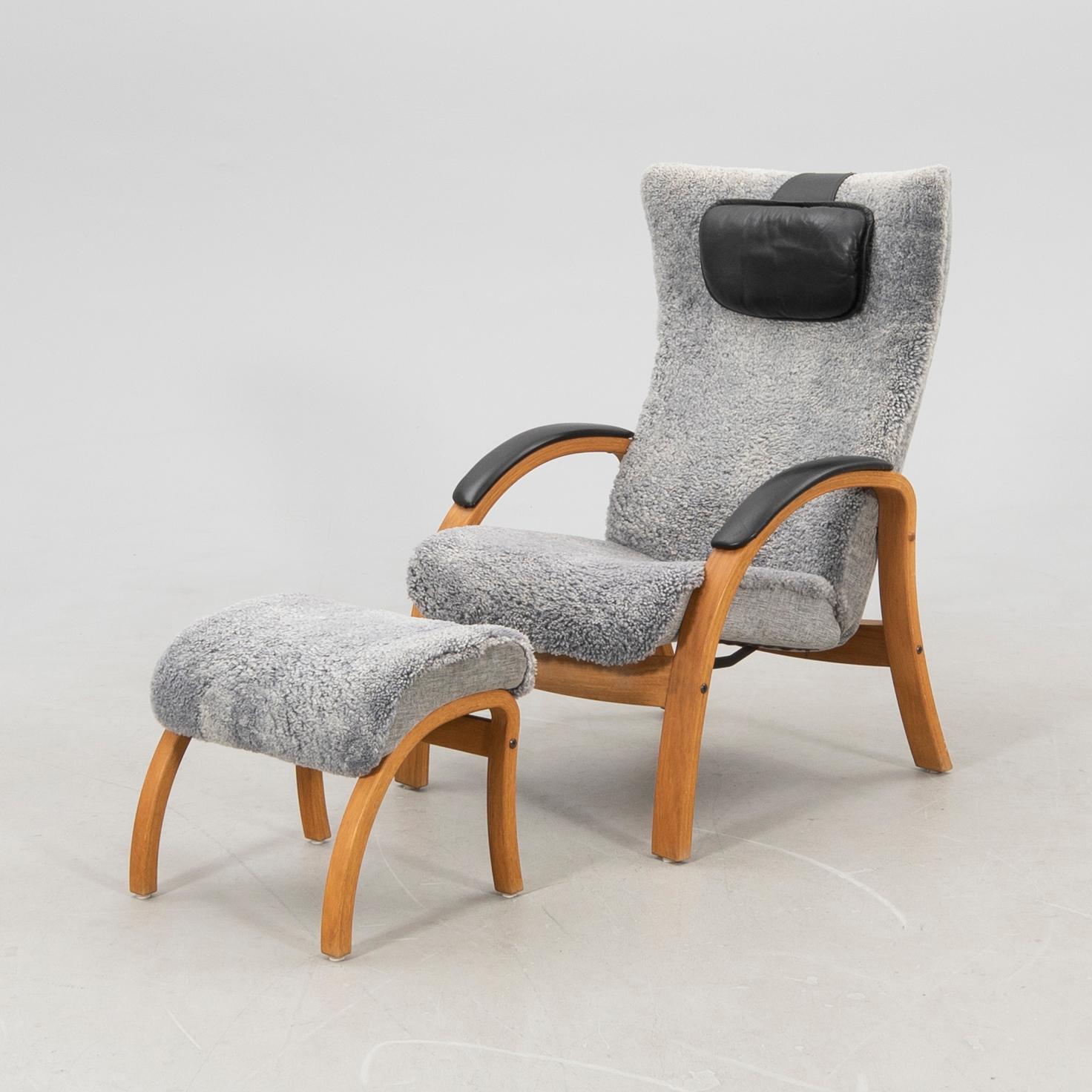 Jahn Aamodt fåtölj med fotpall "Easy" för Conform 2000-tal.