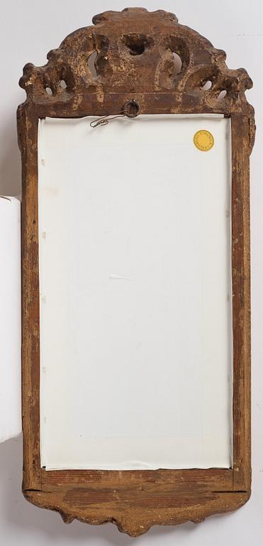 A Swedish gitlwood rococo mirror, Stockholm, later part 18th century.