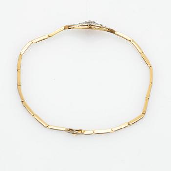 Bracelet, 18K gold with a centre piece set with diamonds.