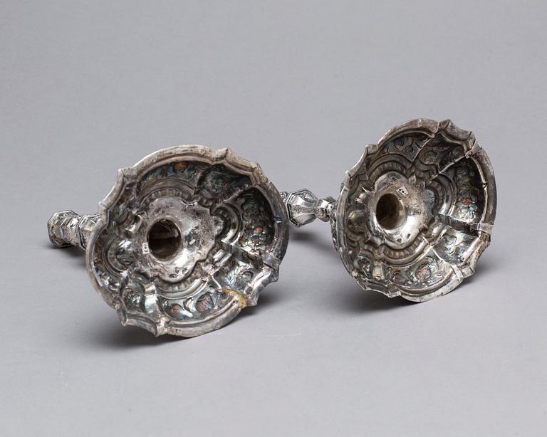 A pair of German 18th century silver candelsticks, marked GFT, Breslau c. 1740.