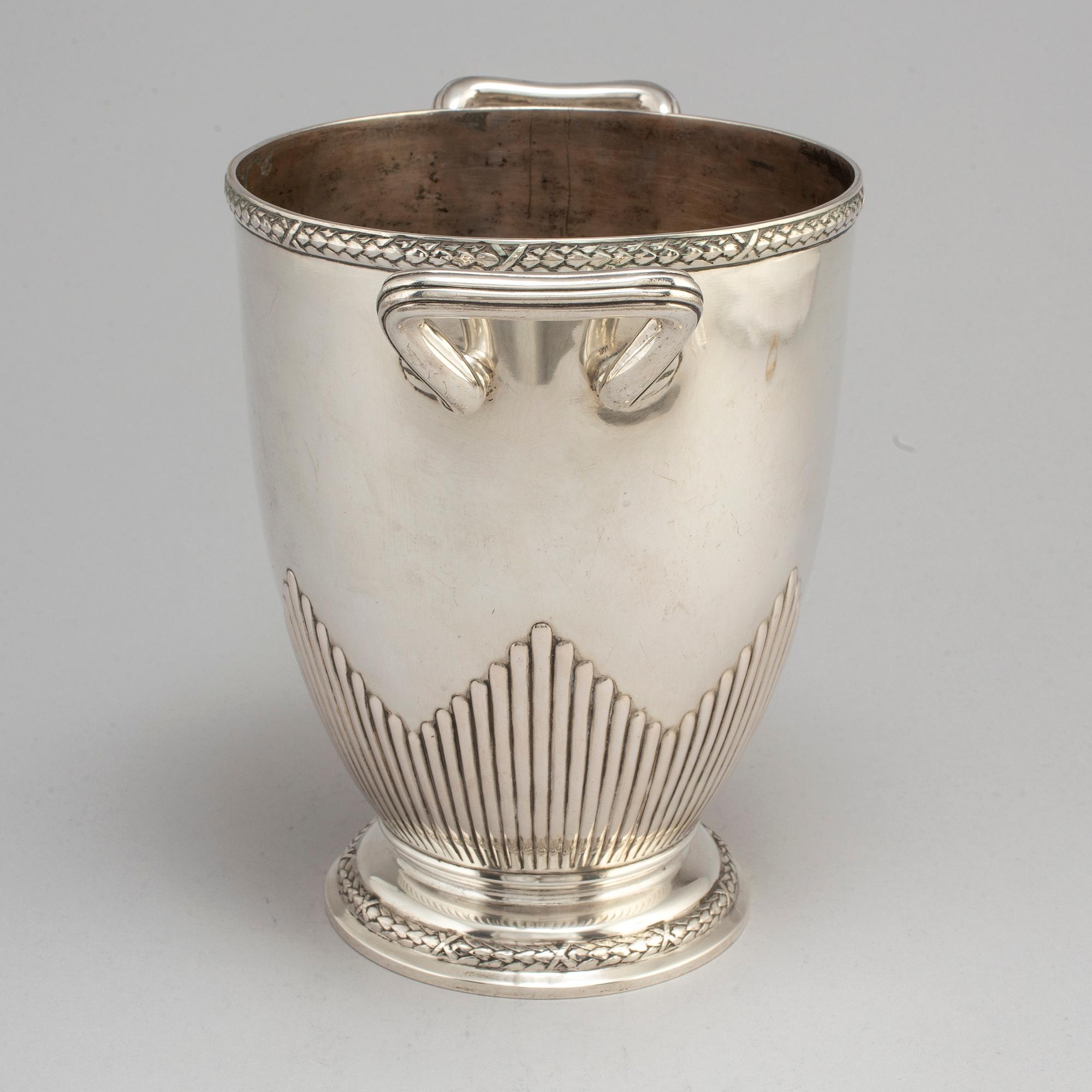 A German silver champagne cooler marked Miller Ulm, eraly 20th Century.