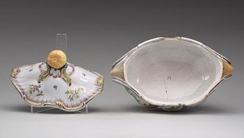 A Swedish faience tureen with cover and matched stand, Rörstrand, 18th Century.