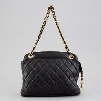 Chanel, a black quilted leather handbag, 1980's.