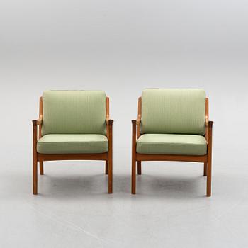 A pair of Ole Wanscher 'Senator' teak easy chairs, for France & Son, Denmark, second half of the 20th century.