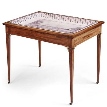 42. A late Gustavian mahogany and faience tea-table, Stockholm, late 18th century.