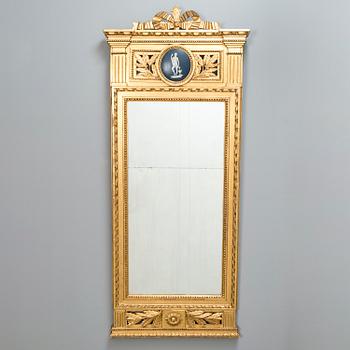 An early 19th century late Neoclassical wall mirror.