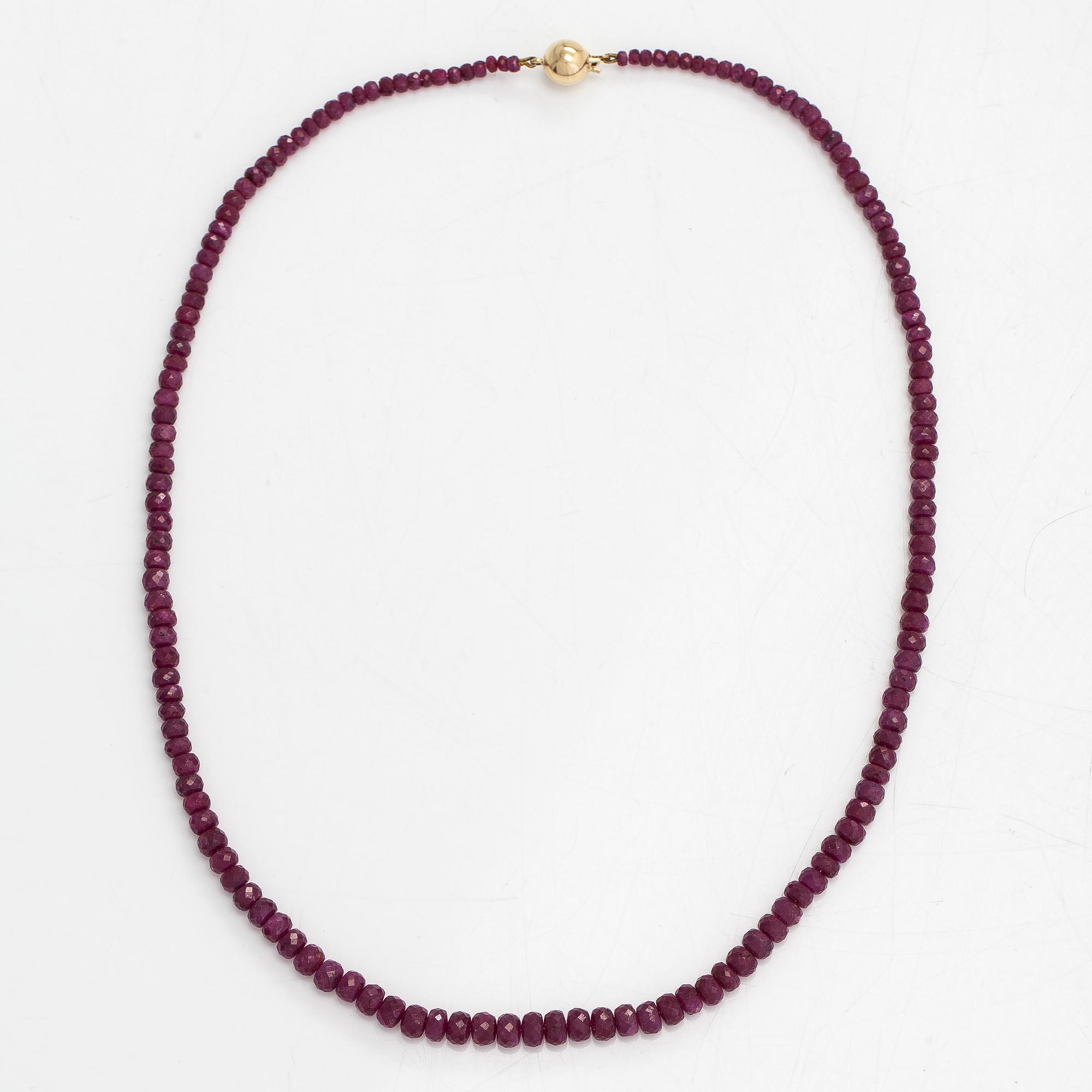 A necklace, set with rubies, clasp in 14K gold.