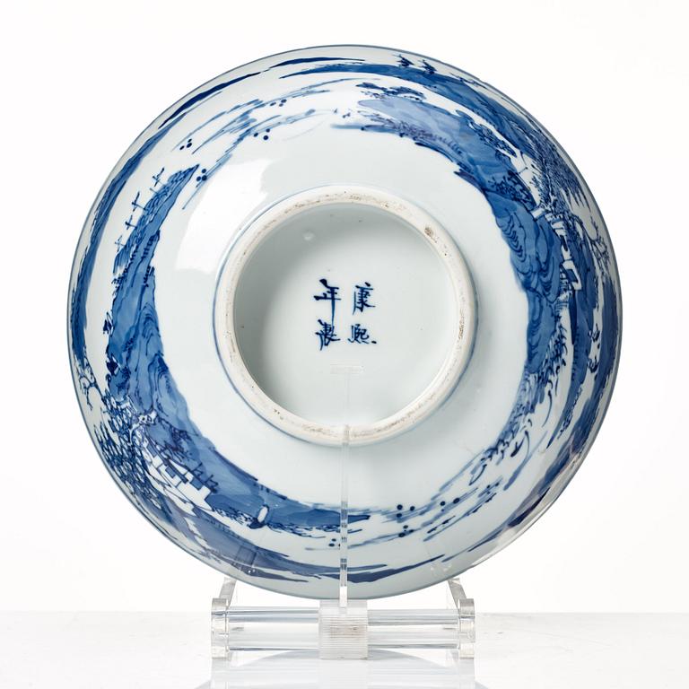 A blue and white bowl, Qing dynasty, 19th Century with Kangxi mark.