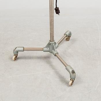 A German metal floor light from the mid 20th century.