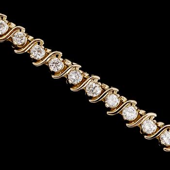 ARMBAND, 14 k guld, briljantslipade diamanter tot ca 5.40 ct.