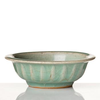 A celadon glazed double fish bowl, Yuan dynasty.