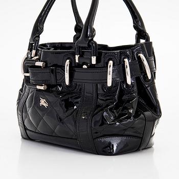 Burberry, a patent leather 'Beaton' handbag.