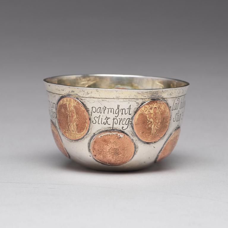 A Swedish 18th century parcel-gilt tumbler with copper coins, mark of Mikael Hammberg, Harnosand (-1758-1789(1790)).