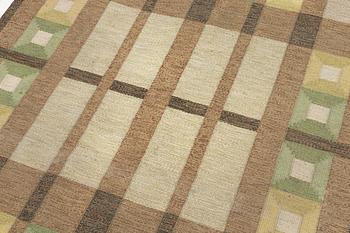 A flat weave carpet, signed, ca. 243 x 165 cm.
