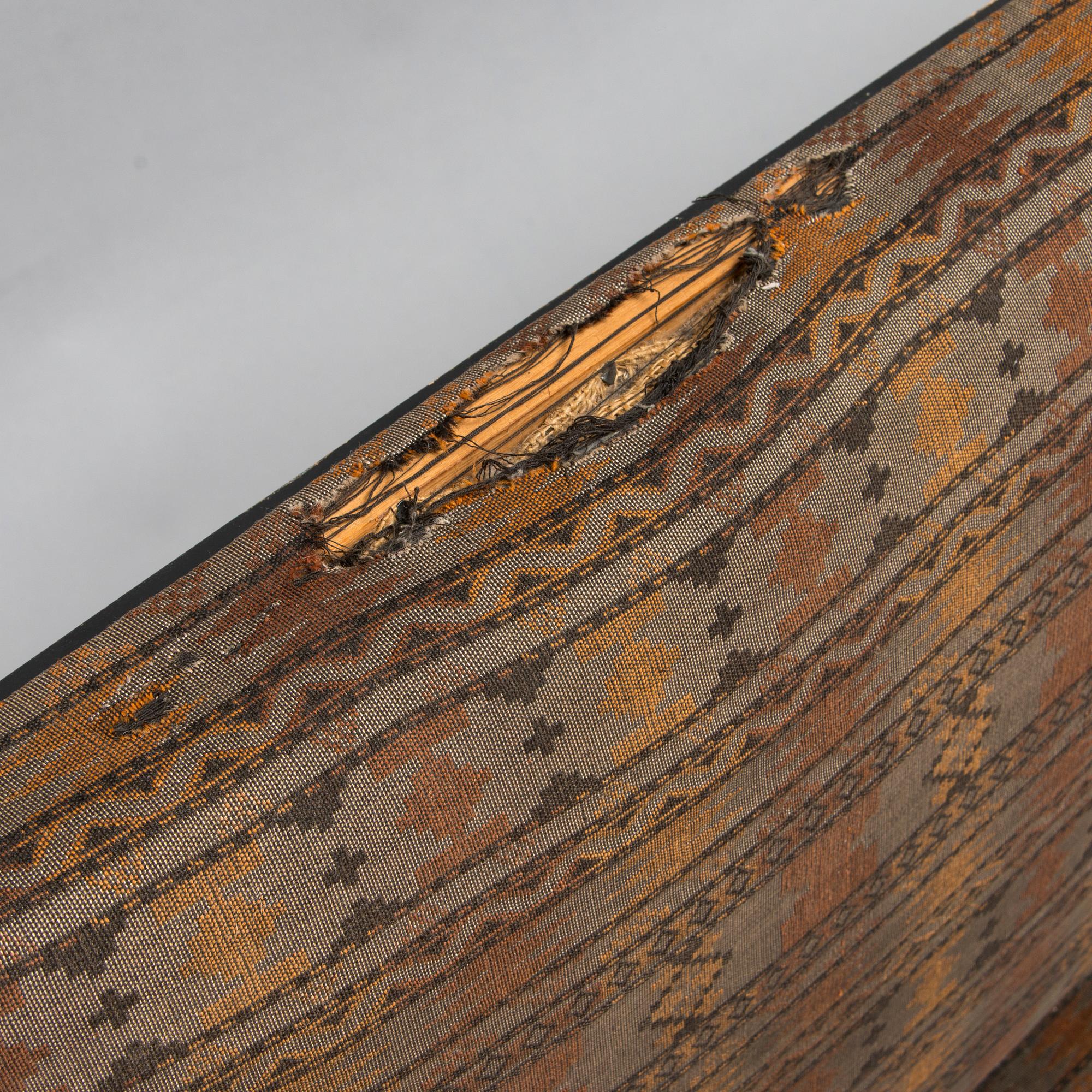 A  1920s Carelian birch veneered sofa.