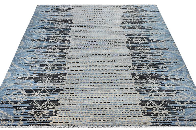 An oriental carpet, c. 302 x 244 cm.