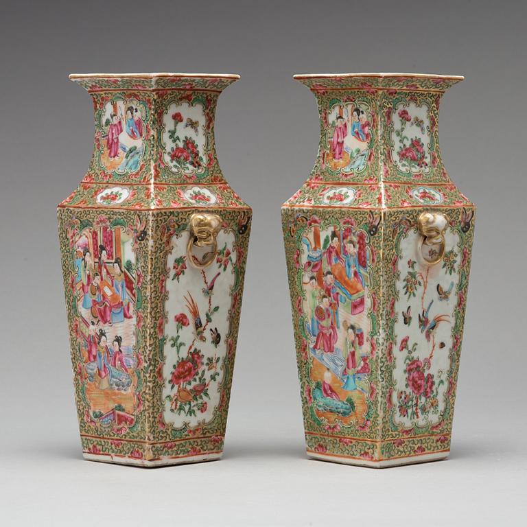 A pair of Canton famille rose vases, Qing dynasty, 19th Century.