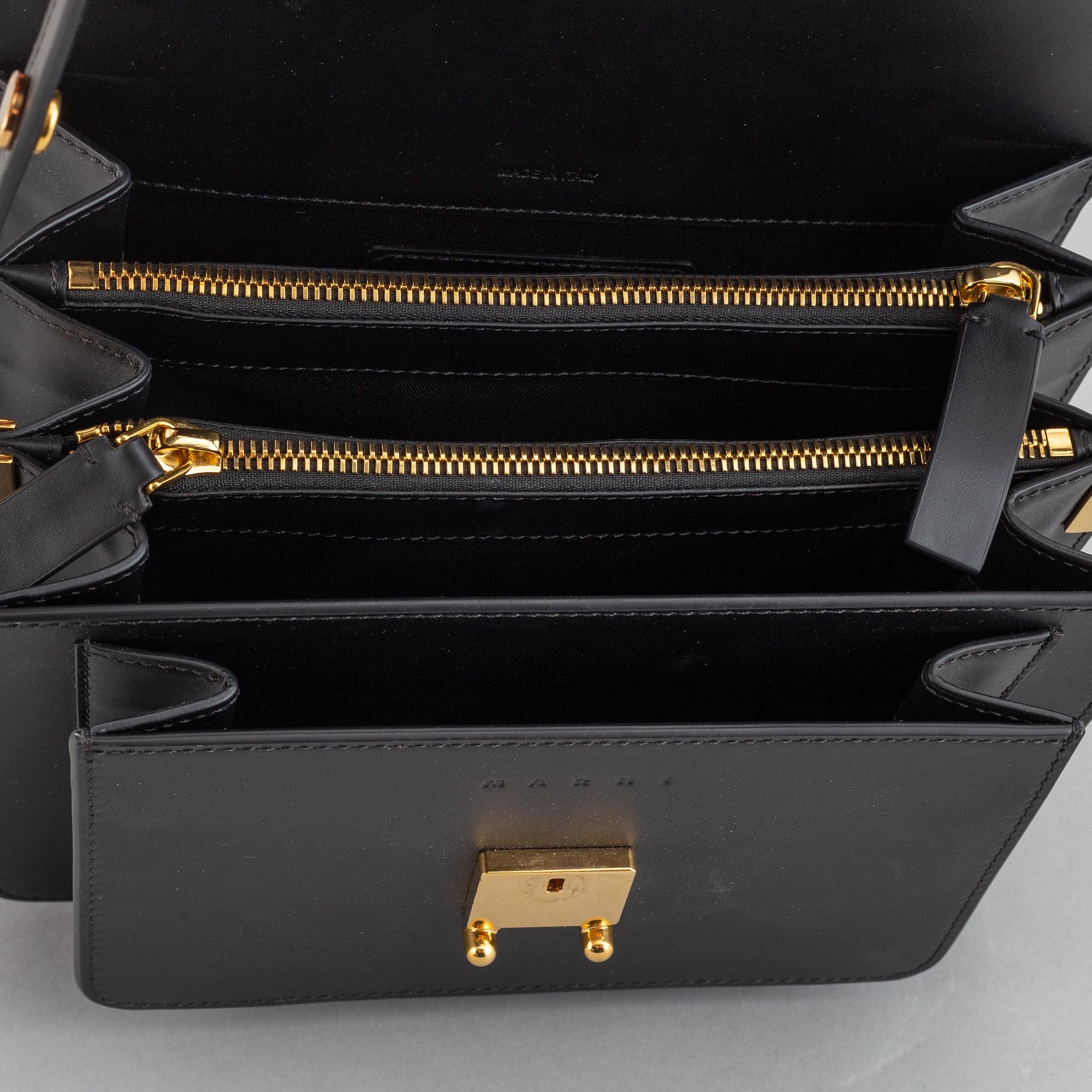Marni, a black leather 'Trunk' cross body bag, 2019.