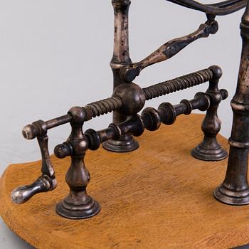 Mechanical Wine Decanting Cradle, around 1900.