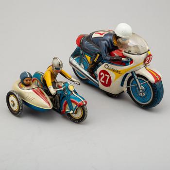 Two 1960s toy motorcycles, China and Japan.