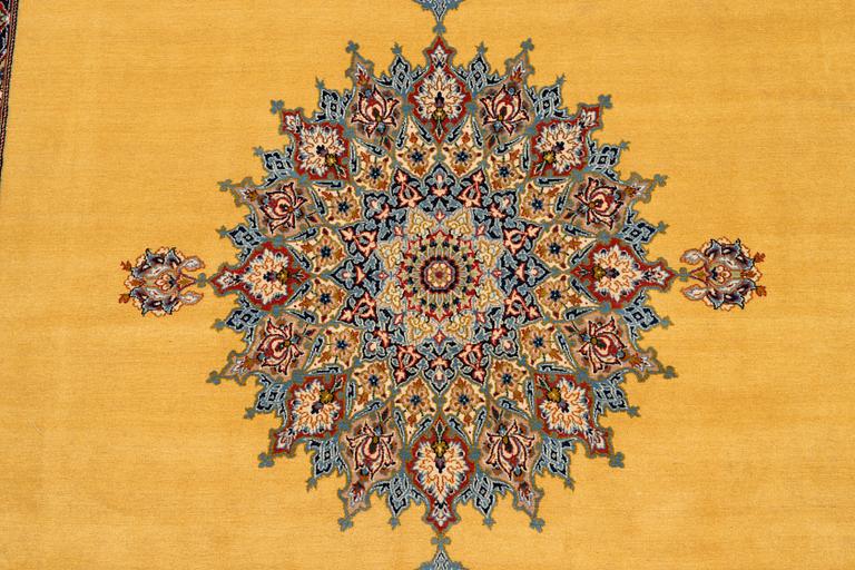 A carpet, Old Esfahan, part silk, ca 311 x 201 cm.