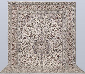A Keshan carpet, 395 x 295 cm.