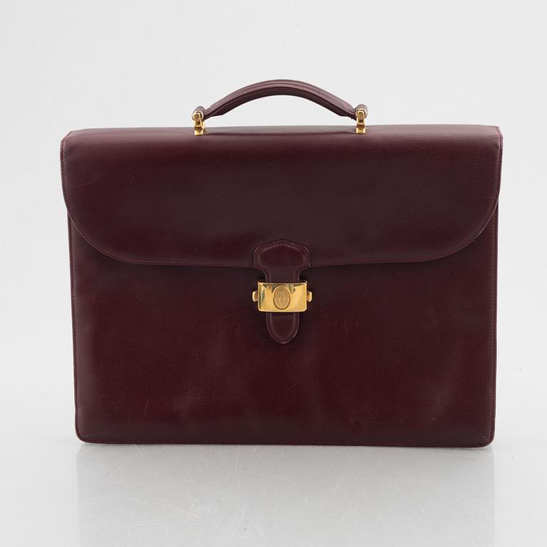 Cartier, a briefcase.