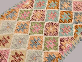 A Kilim runner, approx. 389 x 81 cm.