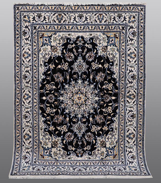 A carpet, Nain, part silk, ca 212 x 153 cm.