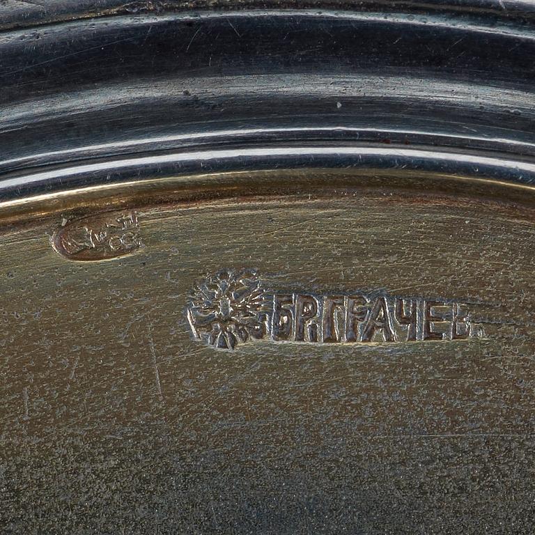 A Russian late 19th century parcel-gilt bread-basket, makers mark of Grachev, St. Petersburg. Imperial Warrant.