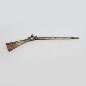 A Persian snaphaunce rifle, 18th century.