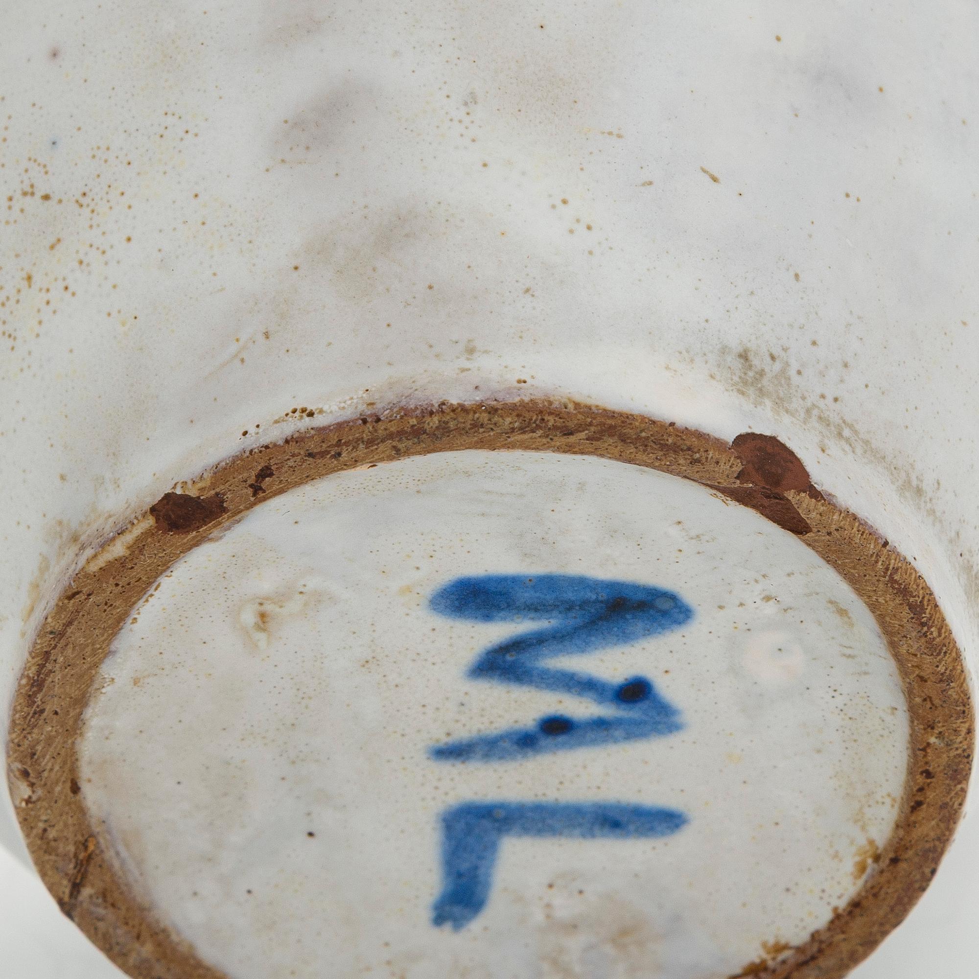 Marita Lybeck, a ceramic jug, signed ML.