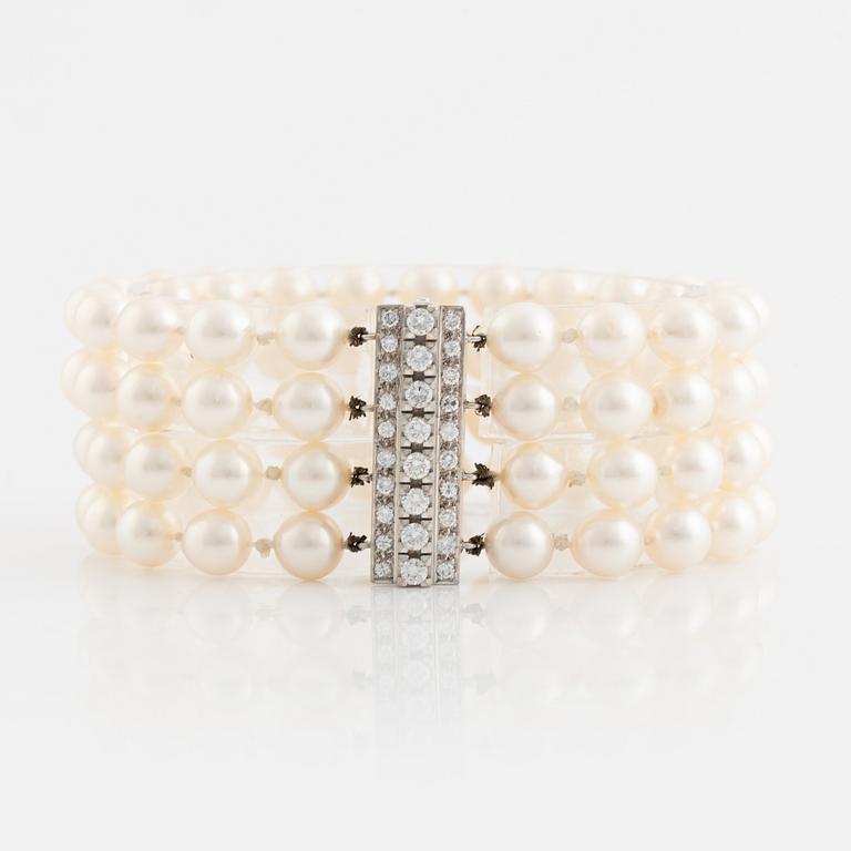 Four strand cultured pearl bracelet, clasp white gold with brilliant cut diamonds.