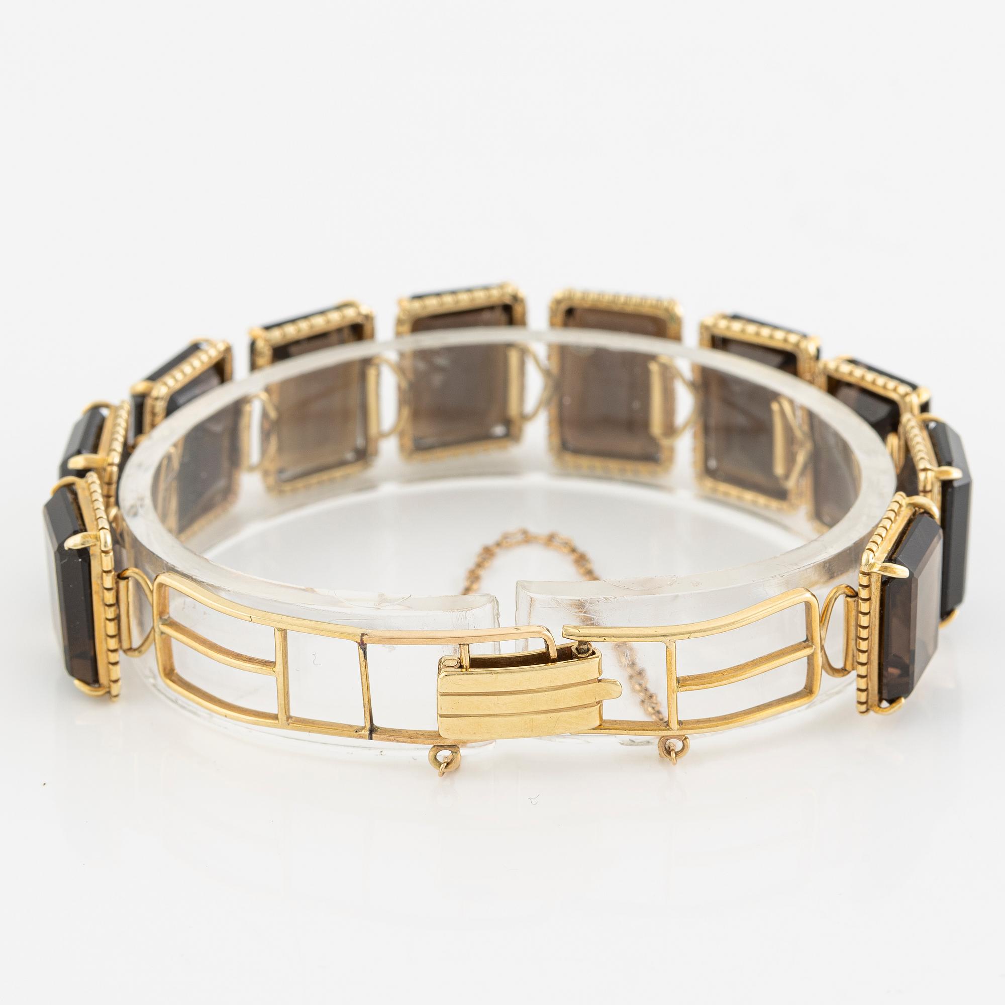Bracelet, 14K gold with smoky quartz.