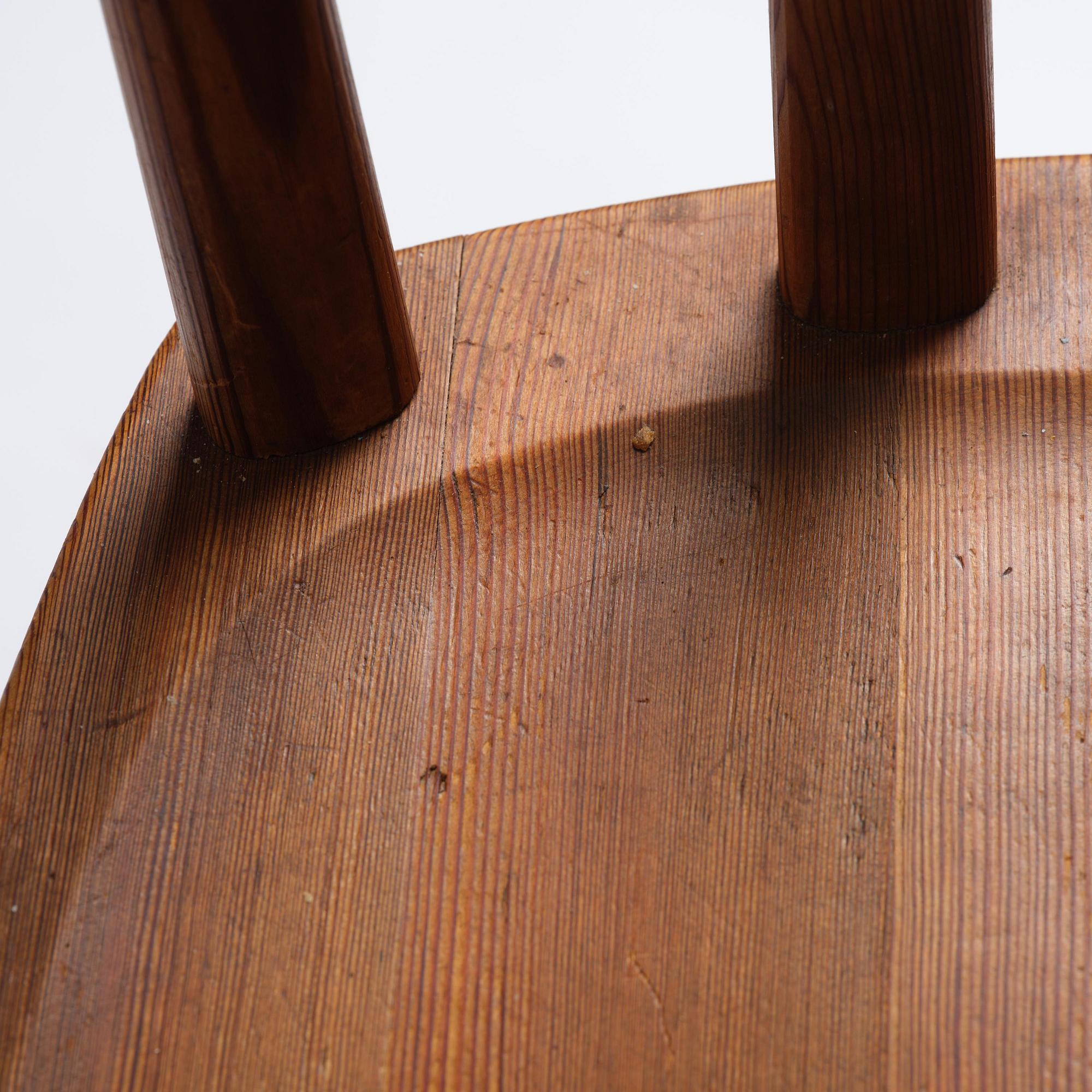 Axel Einar Hjorth, a set of six stained pine "Utö" chairs, Nordiska Kompaniet, Sweden, 1930s.