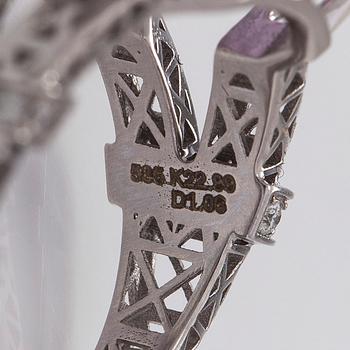 A 14K gold ring with kunzite and diamonds.