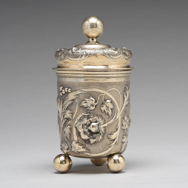 A Russian 19th century parcel-gilt silver beaker and cover, Moscow 1857.