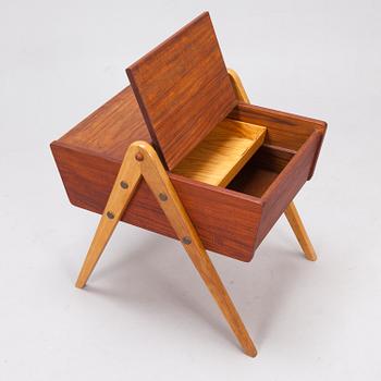 A 1950's sewing table in teak.