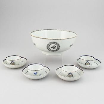 A Chinese Export punch bowl and four cups with stands, Qing dynasty, Jiaqing (1796-1820).