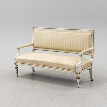 A Gustavian style sofa, circa 1900.