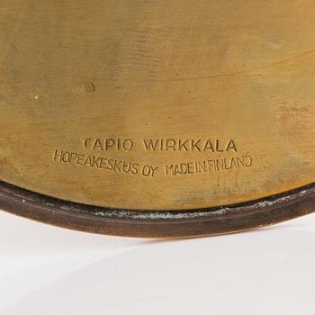 Tapio Wirkkala, A pair of bronze 'Trumpet' candlesticks, stamped Tapio Wirkkala, Hopeakeskus Oy Made in Finland.