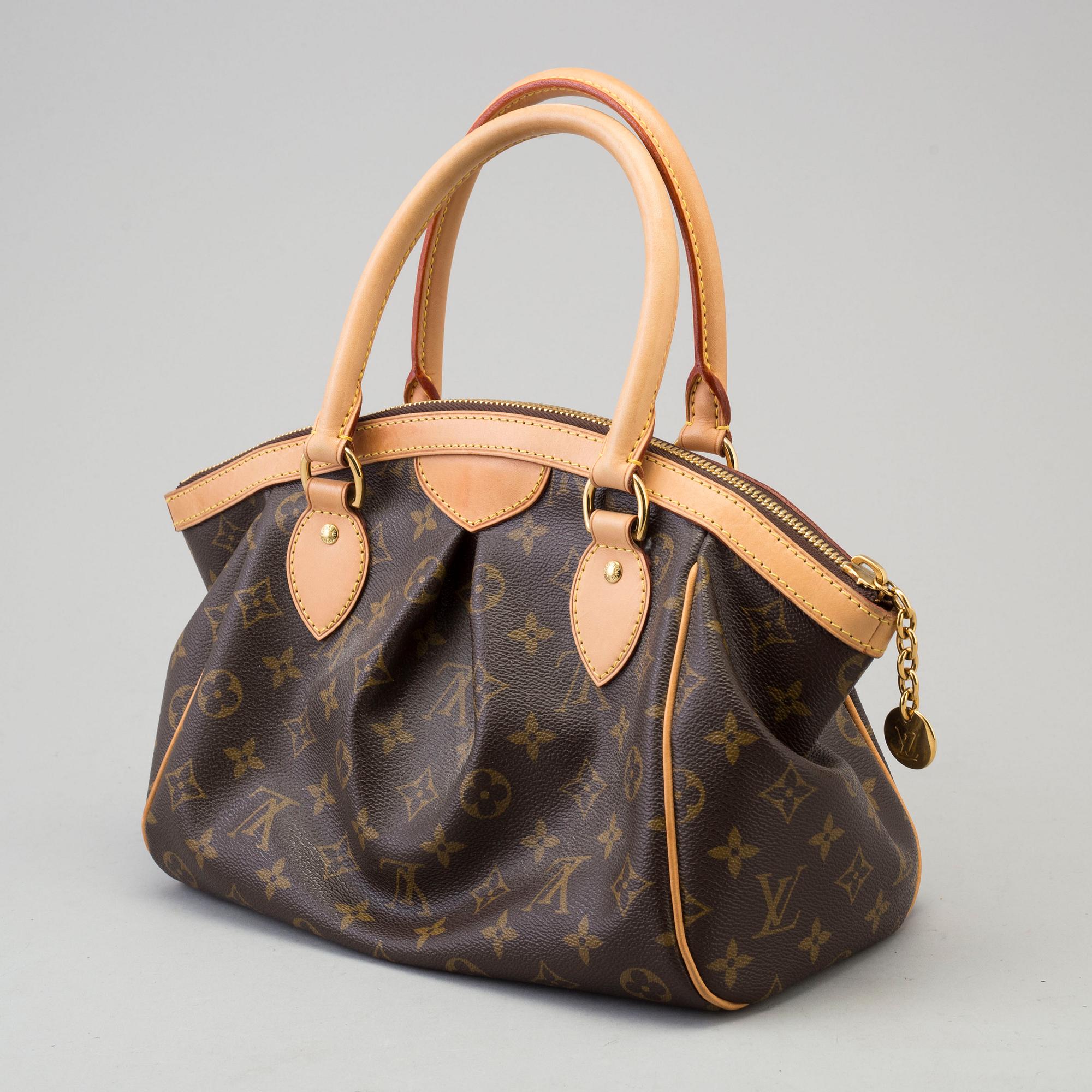 a LOUIS VUITTON 'Tivoli PM' bag.