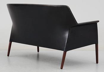 An Ejner Larsen and A Bender Madsen black leather sofa by Willy Beck, Denmark.