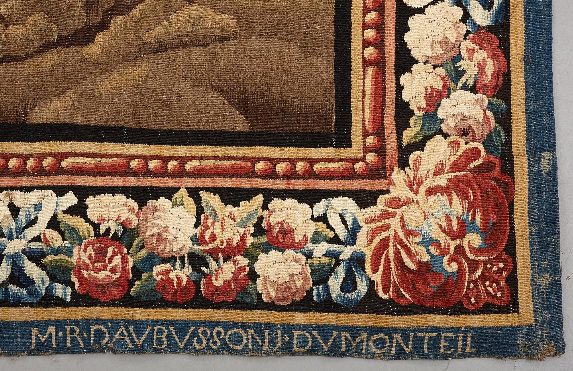 A "Verdure" tapestry, c 279 x 196 cm, signed M.R.D'AVBVSSONj.DVMONTEIL.