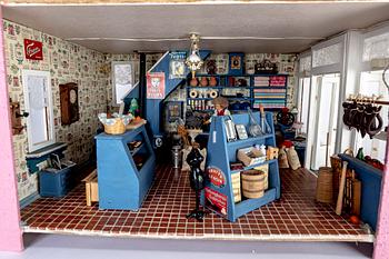 A handmade dolls house later part of the 20th century.